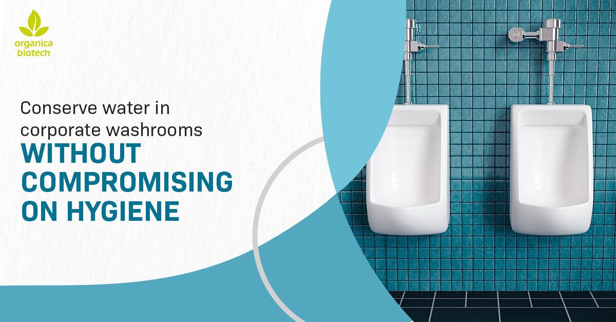 Conserve Water In Corporate Washrooms Without Compromising On Hygiene 1 Two urinals in a blue-tiled washroom, promoting water conservation without compromising hygiene.